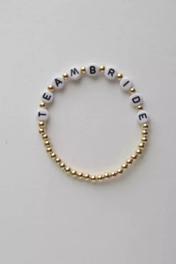 Armband mit goldfarbenen Perlen "Team Bride"